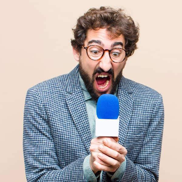 Bring Personality To Your Presentation Through Vocal Expression 2 vocal-variety-with-a-microphone